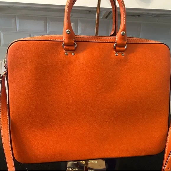 NWOT Kate Spade Orange Leather laptop bag.  May be worn crossbody.  MSRP $230 - Picture 2 of 6